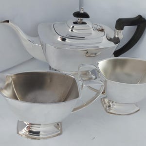Georgian Art Deco Style Three Piece Silver Plated Tea Set; De Montfort Teapot With HSE Milk Jug & Sugar Bowl.