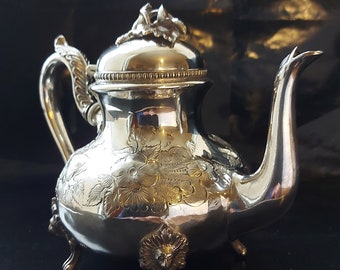 Elkington 403 Victorian Aesthetic Movement Chased Silver Plated Teapot. Dated 1844.