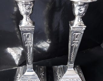 Victorian Neoclassical Ram&#39;s Head Decorated Column Matched Pair of Silver Plated Candlesticks, Circa 1885.