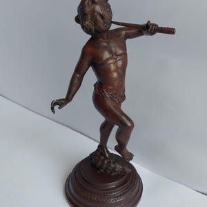 Panesque Male Dancing & Playing A Flute Bronze Statue - 25.5cm High.