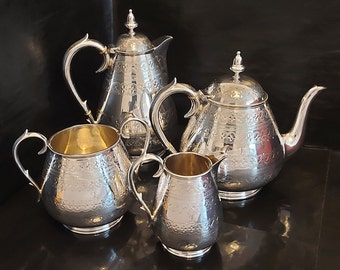 W.Savage & Co, 7098 Large Victorian Four Piece Chased Silver Plated Domed Tea Set with Light Gold Gilt Wash Interior - Circa 1890.