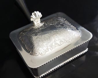 Silent Butler / Trinket Box; Chased Silver Plate, With Ebonised Handle & Scallop Shell Thumb Catch.