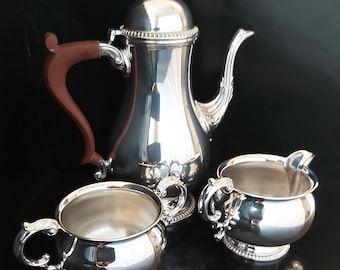 Mappin & Webb Three Piece Silver Plated Tea / Coffee Service With Pine Cone Finial And Gadrooned Borders.