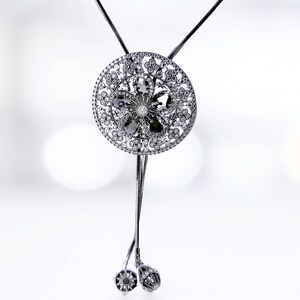 Circle Pendant Necklace with Floral Cut-Out and Crystals Adjustable Length Hypoallergenic Stainless Steel Black