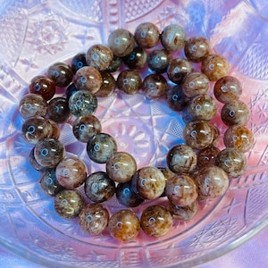 Super Seven Crystal Bracelet: Black Gold Beaded Stretch Jewelry