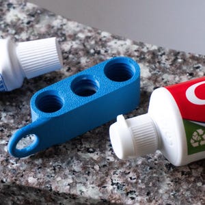 Toothpaste Transfer Tool Keychain 3-Pack | Easy Refill Adapter for Toothpaste Tubes | Travel-Friendly, Waste-Reducing Toothpaste Connector image 1