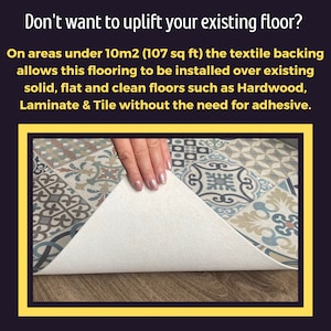 May include: Close-up of a patterned tile flooring with a white backing. The backing is being lifted to show that it can be installed over existing floors without adhesive. The text on the image reads: "Don't want to uplift your existing floor? On areas under 10m2 (107 sq ft) the textile backing allows this flooring to be installed over existing solid, flat and clean floors such as Hardwood, Laminate & Tile without the need for adhesive."