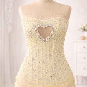 Heart Cutout Corset Mini Dress – Pop Tour–Inspired Performance & Party Look