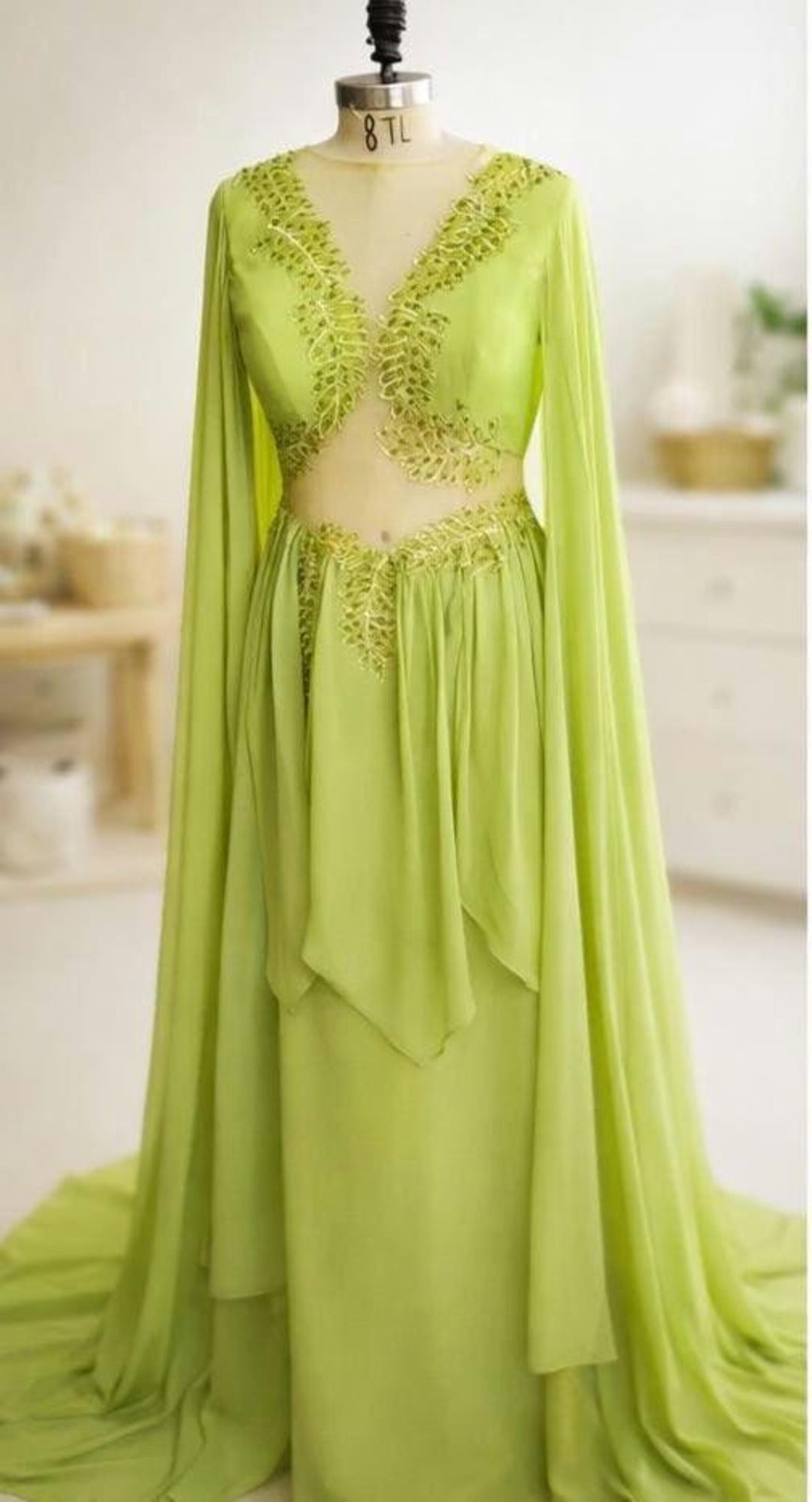 green dress eras tour | This green "folklore/folkmore" dress returns after an 18 show hiatus!  #StockholmTSTheErasTour