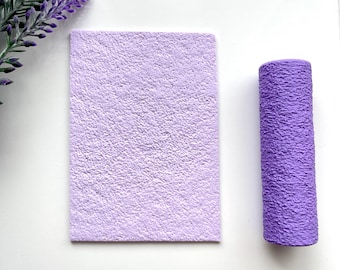 May include: A purple textured sheet of craft paper and a purple textured foam roller.
