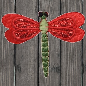 May include: Red and green embroidered dragonfly applique patch.