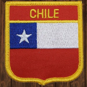 May include: Embroidered patch with the Chilean flag. The flag is red, white, and blue with a white star on the blue portion. The patch has a yellow border and the word "CHILE" in yellow lettering at the top.