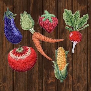 May include: Embroidered felt patches of various fruits and vegetables, including a purple eggplant, a red tomato, a red strawberry, a green radish, a yellow corn cob, and an orange carrot.