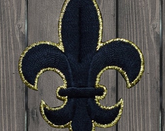 Medium Fleur De Lis Iron On Patch, 1.75" Black & Gold Embroidered Cross Applique Badge for Jackets, Hats, Bags, French Decor or Costume