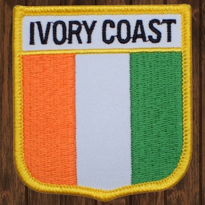 Parche termoadhesivo de Costa de Marfil, insignia de Abiyán, Golfo de Guinea, África Occidental, 7 cm, bordado, recuerdo de viaje coleccionable, para chaquetas y bolsos.