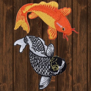 May include: Two embroidered iron-on patches of koi fish. One fish is orange and yellow, the other is black and white.