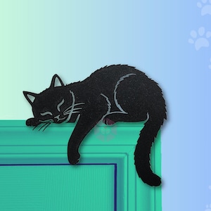 May include: A black cat silhouette, appearing to be sleeping, is perched on a teal surface. The cat's eyes are closed, and its tail hangs down. The background is a gradient of teal and blue with paw print accents.