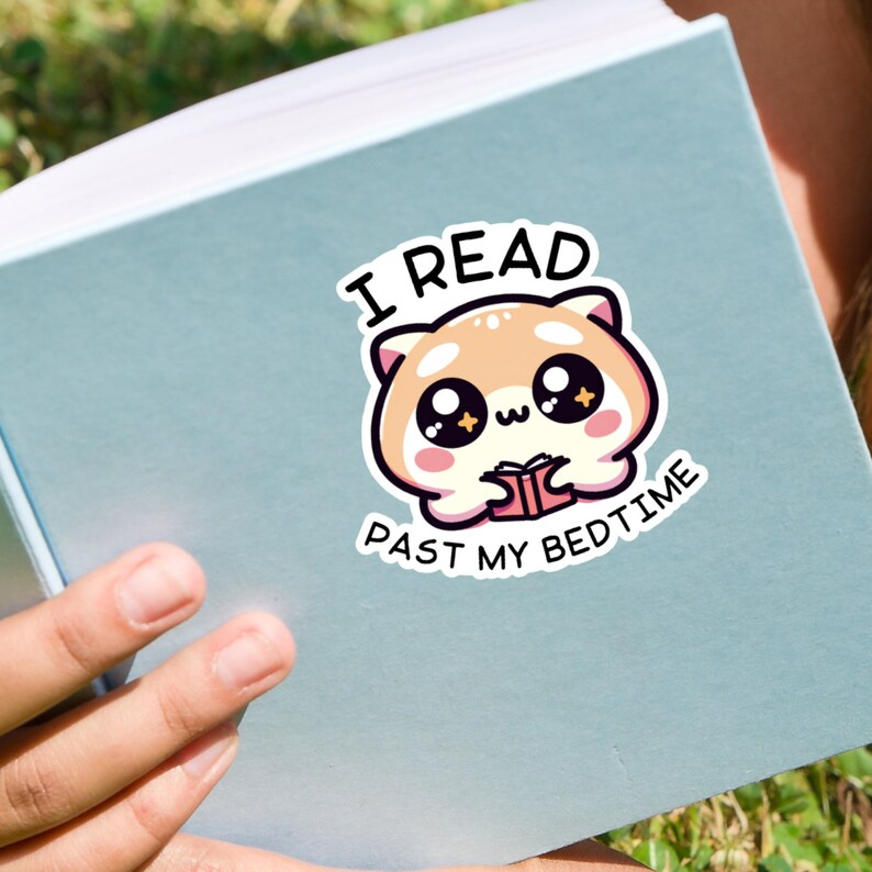 May include: A sticker with a cute cartoon animal reading a book. The text on the sticker says "I read past my bedtime".