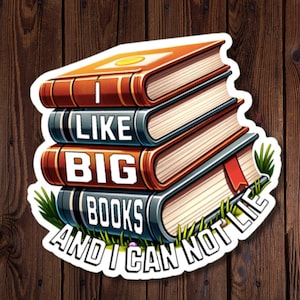 May include: A sticker showing a stack of four books with the text "I LIKE BIG BOOKS AND I CAN NOT LIE." The books are in shades of brown, grey, and orange, with a red bookmark. Green grass surrounds the books.