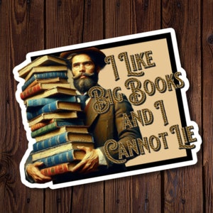 May include: A sticker featuring a man holding a stack of books. The text on the sticker reads "I like big books and I cannot lie."
