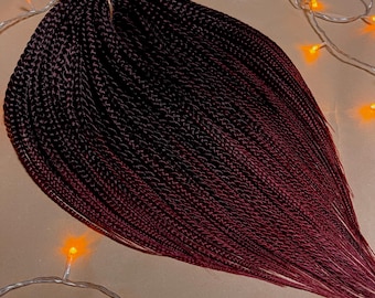 Synthetic braids and senegales twists Color ombre from black to burgundy Double or single ended light and soft Full set DE classic Reusable