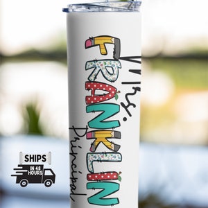 May include: White stainless steel tumbler with a colorful design that says "Mrs. Franklin Principal". The letters are decorated with pencils, apples, and other school-themed patterns.