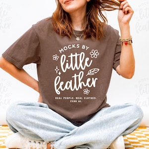 Comfort Colors 1717 t-shirt mockup by mocksbylittlefeather. A Print on Demand Mockup Shop that provides high quality png mockups for POD sellers. Little feather mocks uses only real models, real products, no Ai ever.