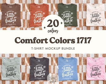 May include: A mockup bundle of Comfort Colors 1717 t-shirts in various colors, including brown, orange, green, and cream. Each shirt features the text "mocks by little feather". The image also displays the text "20 colors" and "T-SHIRT MOCKUP BUNDLE".