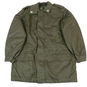 May include: A green military-style jacket with two pockets on the front and two on the chest. The jacket has a zip closure and a button-up collar. There are two stars on the collar.