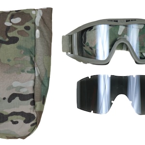 May include: An olive-green tactical goggle set with a camouflage carrying pouch and a spare lens. The goggles have a wide, curved lens with a reflective surface. The spare lens is dark and tinted.