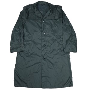 May include: A dark green long-sleeved raincoat with a hood and button closure.