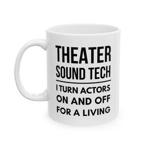 May include: A white ceramic mug with a handle on the left side. The mug features black text that reads: THEATER SOUND TECH, followed by a horizontal line, and the text: I TURN ACTORS ON AND OFF FOR A LIVING. The design is centered on the mug.