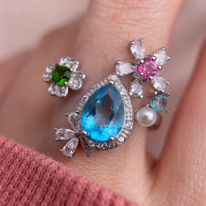 Anillo Multigemas, Anillo Jardín Maravilla, Topacio Azul Natural, Anillo Glam Cluster, Anillo Intrincado, Topacio Rosa, Diópsido, Anillo de Cristal Natural
