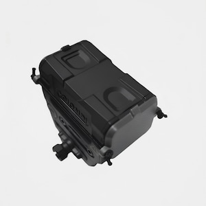 May include: A black rectangular electronic device with a textured surface and the word HOLOSUN embossed on the side. The unit features a top-mounted battery compartment, a side-mounted adjustment knob, and small protruding levers on the corners.