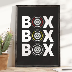 May include: Black and white graphic print of the word "BOX" repeated three times. Each "BOX" has a stylized tire with the word "ZERO" printed on it.