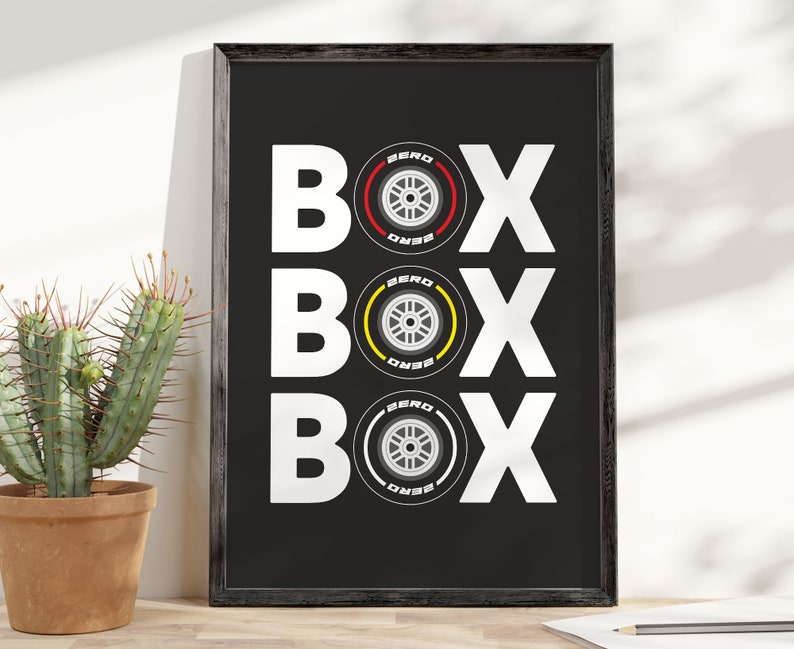 May include: Black and white graphic print of the word "BOX" repeated three times. Each "BOX" has a stylized tire with the word "ZERO" printed on it.