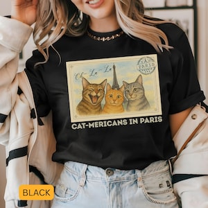Camiseta engraçada de férias com gatos, camiseta vintage com cartão postal, camiseta com gato de férias - americanos em Paris, presente de viagem para amantes de gatos, presente de viagem para meninas