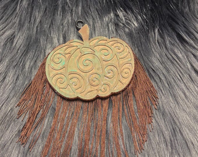Tooled pumpkin design freshie