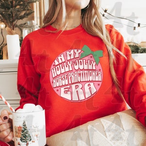 In My Holly Jolly Nurse Practitioner Era Shirt Nurse Practitioner Gift for NP Graduation Gift Nurse Practitioner Sweatshirt Nurse Pullover
