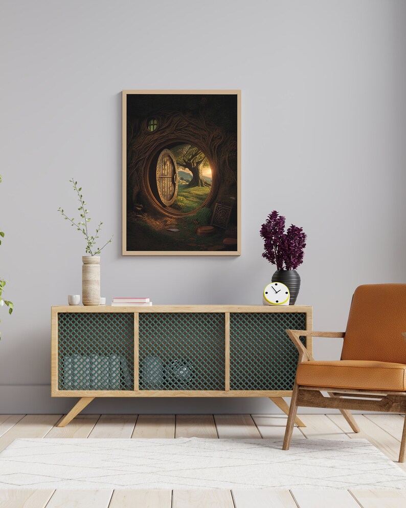May include: A framed print of a fantasy illustration depicting a round wooden door opening into a lush green forest with a sunlit sky. The door is set into a tree trunk with roots and branches surrounding it.