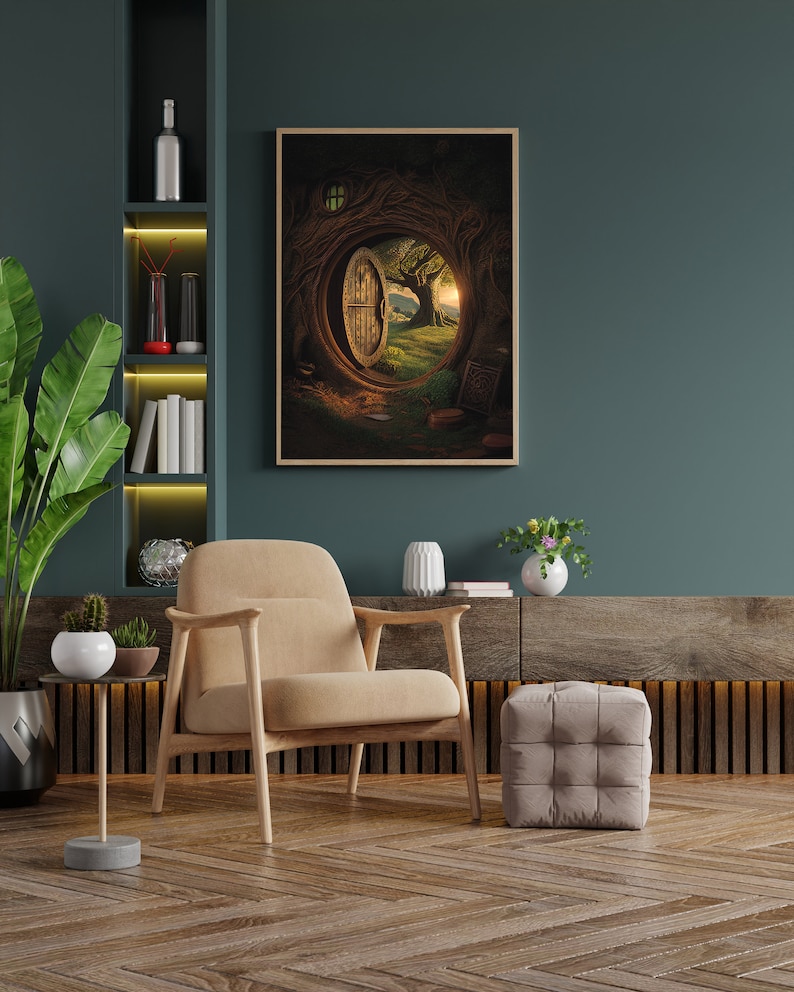 May include: A beige armchair with wooden legs sits in front of a framed print of a door in a tree trunk. The print is on a teal wall with a shelf to the left and a wooden shelf with a vase of flowers on the right. The floor is a dark wood with a herringbone pattern.