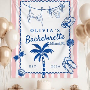 May include: A white and pink striped banner with blue illustrations of a bikini, hat, sunglasses, seashells, and a palm tree. The banner reads "OLIVIA'S Bachelorette Miami, FL EST. 2026". Gold and white balloons are in the background.
