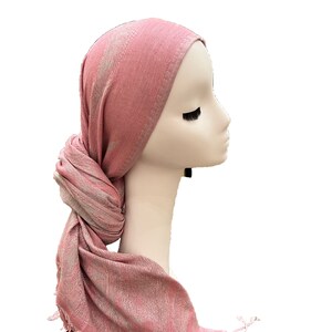 Beautiful worn as a head covering scarf.