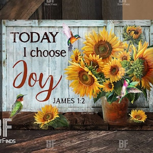May include: A wooden sign featuring a vibrant bouquet of sunflowers in a rustic vase, with hummingbirds. The sign reads "TODAY I choose Joy" with the Bible verse James 1:2. The background has a distressed, light blue and white wooden plank design.