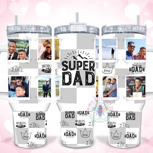 May include: Three white tumblers with a checkered pattern and photos of a father and his children. The tumblers have a handle and a straw. The text "Super Dad" is printed on the tumblers.