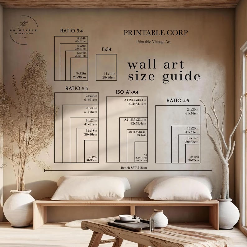 May include: A wall art size guide with various dimensions in inches and centimeters. The guide includes ratios like 3:4, 2:3, and 4:5, along with ISO A1-A4 sizes. The image features a neutral color palette and a bench.