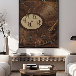 May include: A framed art print depicts a surreal scene of miniature people dancing on a giant vinyl record. The artwork features a warm color palette with a turntable and a lamp in the background. The text "printablecorp" is visible in the top left corner.