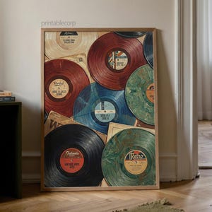 May include: A framed print featuring a collage of vintage vinyl records in shades of red, blue, green, and black. The records have labels with text such as "Retro" and "Vintage Vinyl Hits". The print is displayed in a room with a wooden floor.