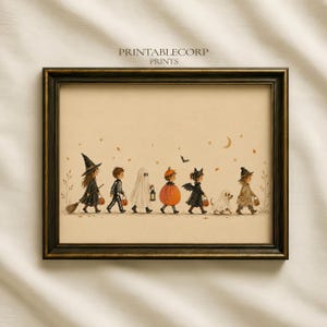 May include: A framed art print titled PRINTABLECORP PRINTS featuring a watercolor illustration of children in Halloween costumes including a witch, skeleton, ghost, pumpkin, bat, and a dog in a ghost costume, all carrying small orange pumpkin buckets.