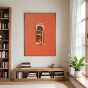 May include: A framed art print featuring a minimalist illustration of a window on a vibrant orange wall. The window is outlined in a light yellow color, with a person's legs visible. The artwork is displayed in a room with a bookshelf and wooden furniture.